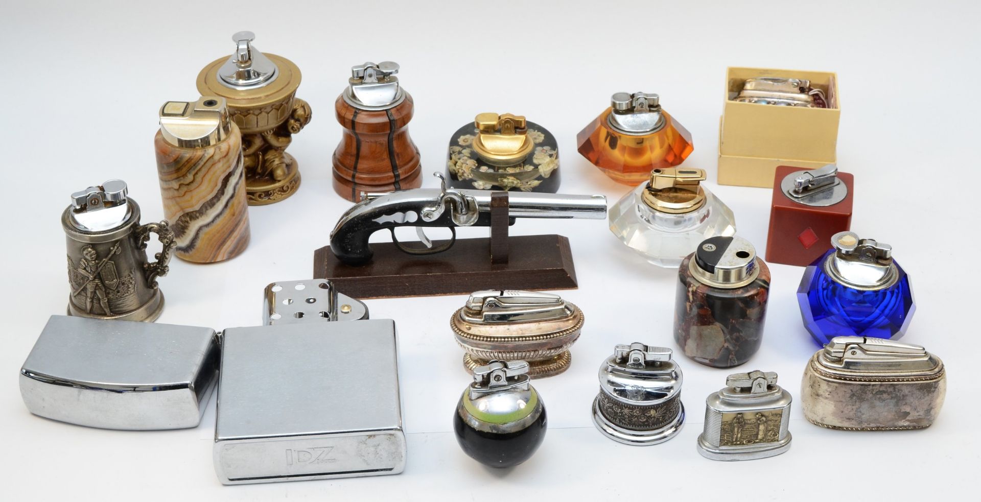 A collection of mid 20th century and later cigarette table lighters, to include novelty examples,