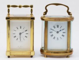 A 20th century English 8 day carriage clock, the brass case with enamelled dial, together with a