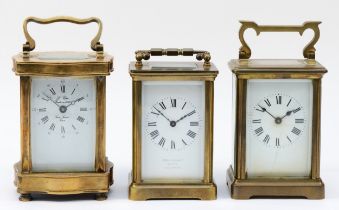 Three 20th century brass carriage clocks, having enamelled dials with 8 day movements, 12cm tall. (