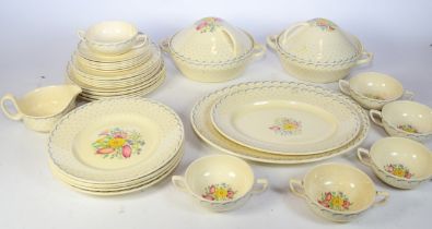 A mid 20th century Susie Cooper part dinner service 'Printemps' pattern, number 2205, comprising six