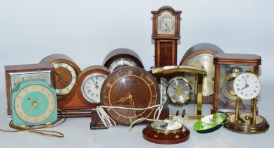 A collection of early 20th century and later clocks, to include mantel, carriage, traveling and