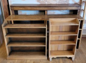 Early 20th century and later freestanding open bookshelves, comprising a pair of mahogany three