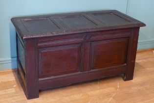 A late 17th century and later oak three panel coffer, raised on stile supports 114 x 54 x 60cm.
