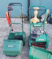 A Qualcast classic petrol driven lawn mower, together with a Atco windsor 145 electric lawn mower