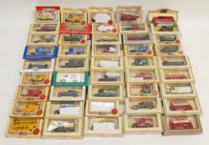 A collection of over seventy boxed promotional diecast model vehicles, primarily by Lledo.