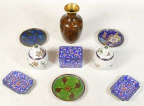 Two pear form Cloisonne jars and covers, three circular dishes, a vase, a Chinese lidded box and two
