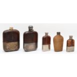 Four mid 20th century silver plated and leather hip flasks, largest 17cm, together with a rattan