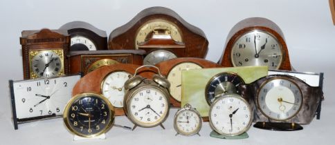 A collection of early 20th century and later clocks, to include mantel, carriage, traveling alarm