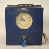 A mid 20th century wall mounted 'clocking in' machine, cast metal casing with twelve hour electric