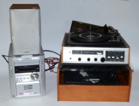 A 1970s Garrard turntable, together with a Philco 'Super Twenty' turntable and a Sharp micro Hi-Fi