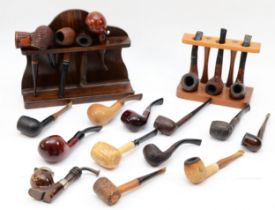 A collection of tobacco pipes, makers to include E.A Carey, Sharrow, Courrieu, together with two