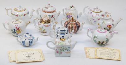 Franklin Mint; A set of twelve porcelain teapots 'The Victoria & Albert Museum' each exact re-