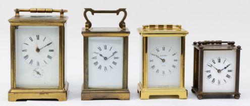 A collection of four mid 20th century 8 day brass carriage clocks, for spares or repair. (4)