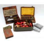 A collection of late 19th century printers seals and printing stamps, loose and cased.