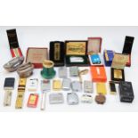 A collection of mid 20th century and later cigarette lighters, pocket and table, gas and petrol