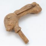 A carved driftwood staff in the form of a hares head, 19cm long.