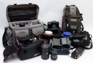 A collection of camera equipment and accessories to include a pair of Courtenay solarflash 4000