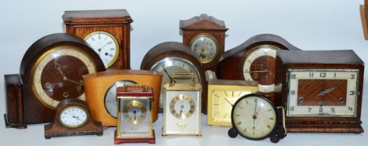 A collection of early 20th century and later clocks, to include mantel, carriage, traveling and