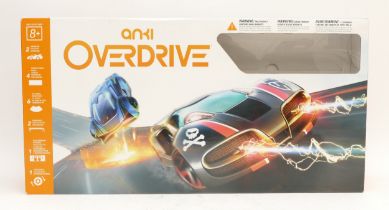 An Anki 'Overdrive' interactive robotic battle racing set, boxed.