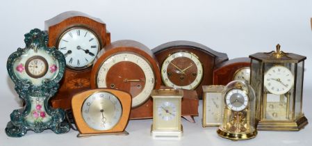 A collection of early 20th century and later clocks, to include mantel, carriage, traveling and