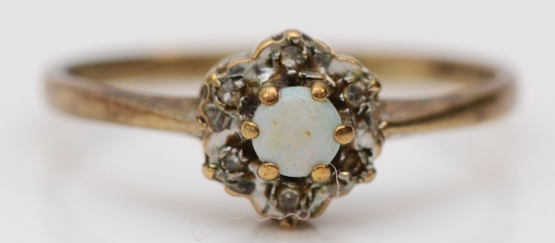 A 9ct gold opal and diamond cluster ring, M, 1.2gm