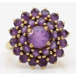 A 9ct gold and amethyst cluster ring, diameter 16mm, L, 3.3gm