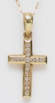 A 9ct gold and brilliant cut diamond set cross pendant, stated weight 0.11cts, 22mm overall,