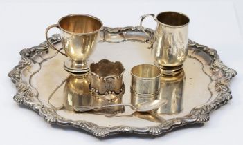 Two silver christening mugs, two silver napkin rings, 173gms, together with an electroplated