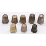 Six silver thimbles and a Sterling Silver example, 30gm