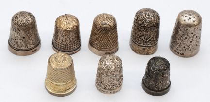 Six silver thimbles and a Sterling Silver example, 30gm