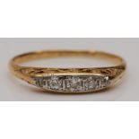 An Edwardian 18ct gold and old cut brilliant diamond five stone ring, carved setting, L, 1.5gm,