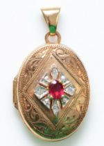 A 9ct gold ruby and diamond locket, 20 x 16mm, 2.1gm