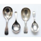 A George III silver fiddle pattern caddy spoon, London 18811, two Victorian examples, London 1845