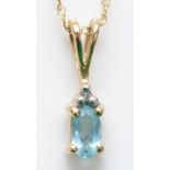 A 9ct gold, topaz and diamond pendant, chain, 0.7gm