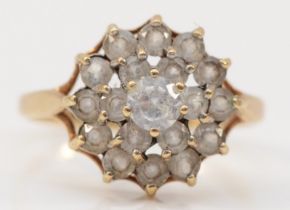 A 9ct gold and white stone cluster ring, h 1/2, 1.9gm