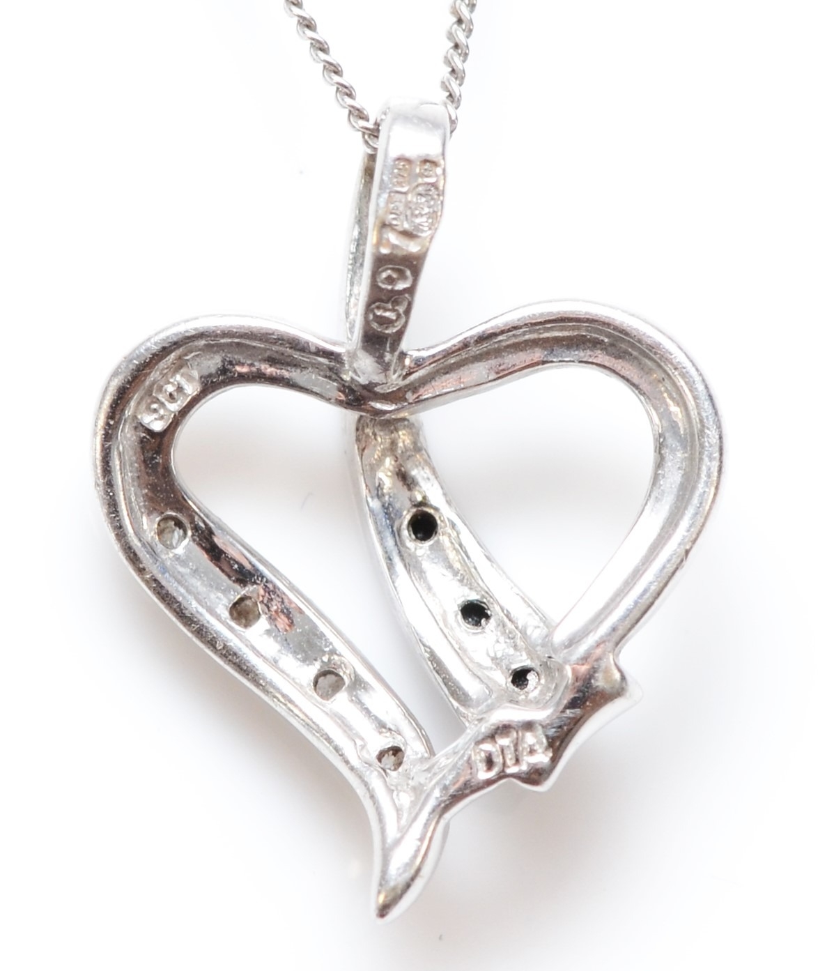 A 9ct white gold black and white diamond heart pendant, chain, 1.9gm - Image 2 of 2