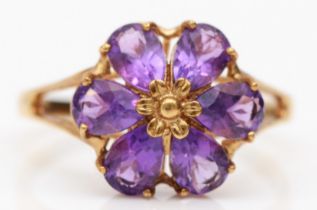 A 9ct gold and amethyst flowerhead cluster ring, R, 2.1gm
