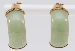 A 9ct gold mounted jadeite ear studs, 18 x 8mm