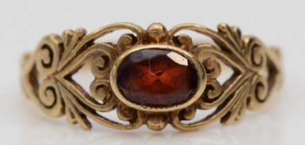 A 9ct gold and garnet dress ring, M, 1.8gm