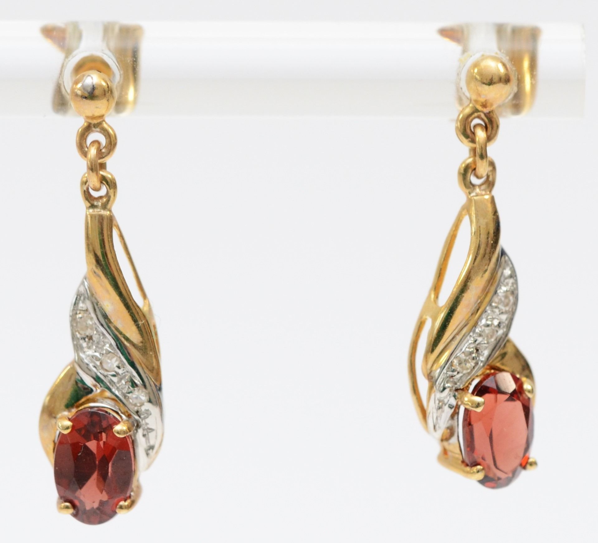 A 9ct gold pair of diamond and garnet ear pendants, 20mm, 1.7gm