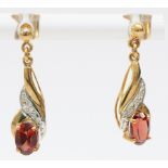 A 9ct gold pair of diamond and garnet ear pendants, 20mm, 1.7gm