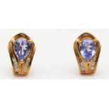 A 9ct gold, diamond and tanzanite pair of ear studs, 1.3gm