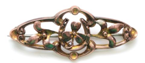 An Edwardian 9ct rose gold horseshoe and shamrock openwork brooch, 41mm, 1.6gm