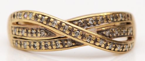 A 9ct gold single cut diamond three row twist ring, M 1/2, 2.7gm