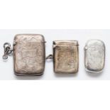 Three silver vesta cases, Birmingham 1896, 1911 and 1920, 58gms.