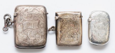 Three silver vesta cases, Birmingham 1896, 1911 and 1920, 58gms.