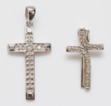 A 9ct white gold and diamond cross pendant, 30mm overall and another smaller, 2.5gm