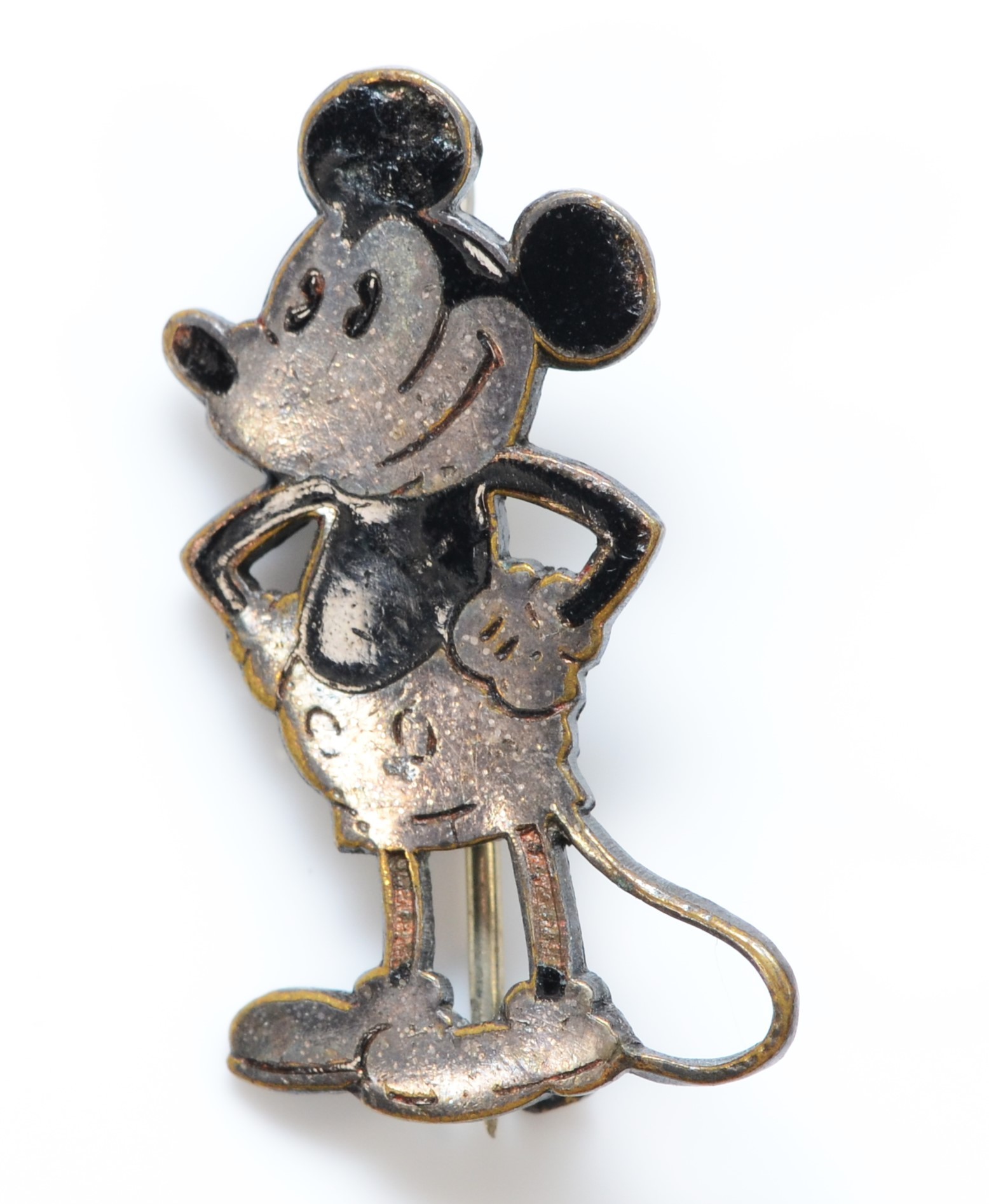 Charles Horner, a white metal and black enamelled brooch/badge in the form of Mickey Mouse with