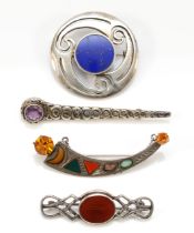 A Scottish silver and hardstone crescent brooch and three other Celtic designed brooches, 47gm