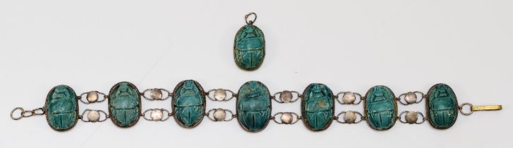 A low grade silver and faience scarab beatle bracelet, 17cm, together with a matching pendant.